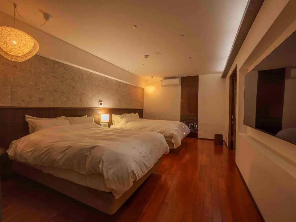 Bed in Kannawa Onsen Hotel Sansuikan