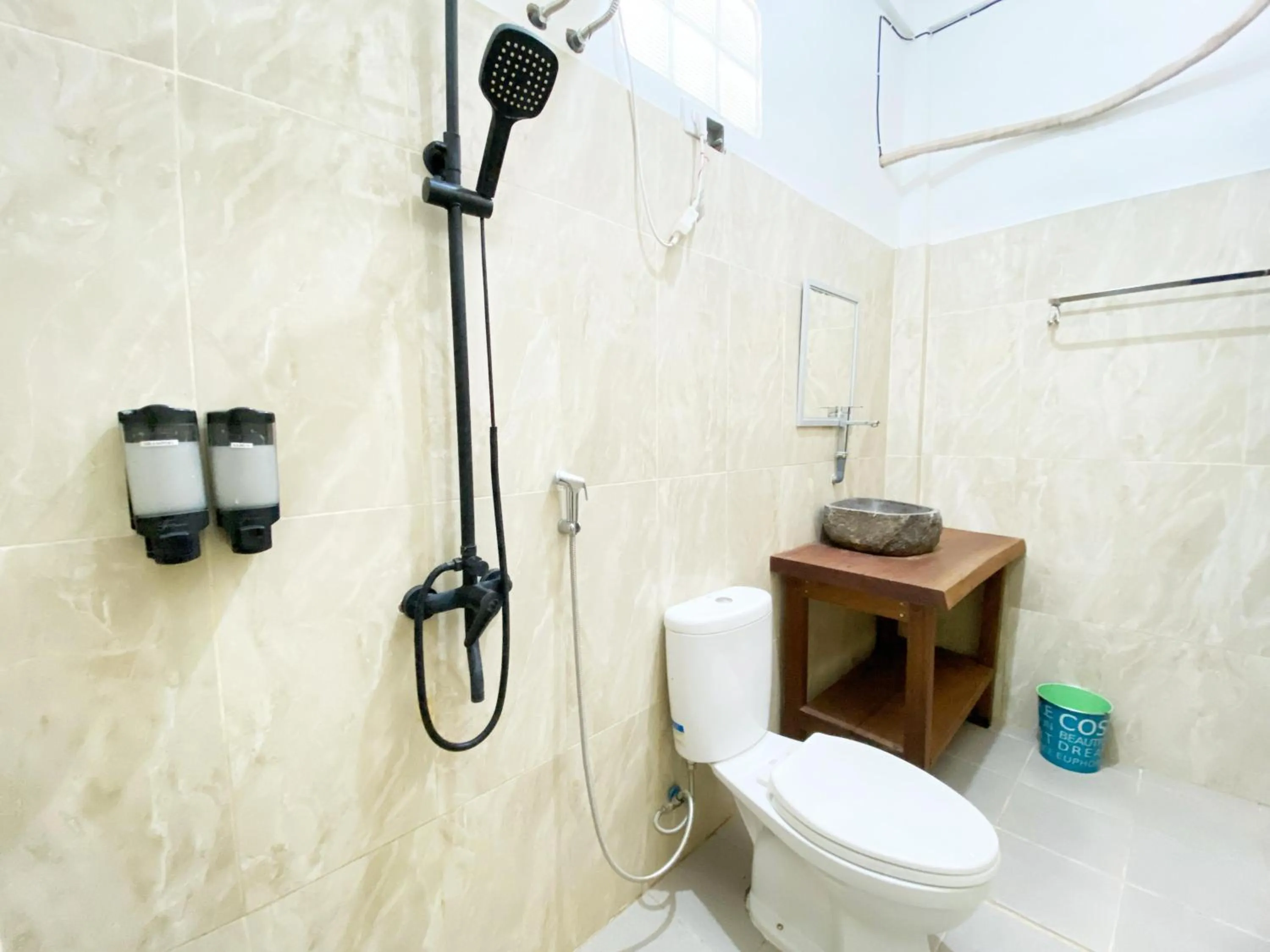 Shower in Bujai Mentawai Griya Hotel