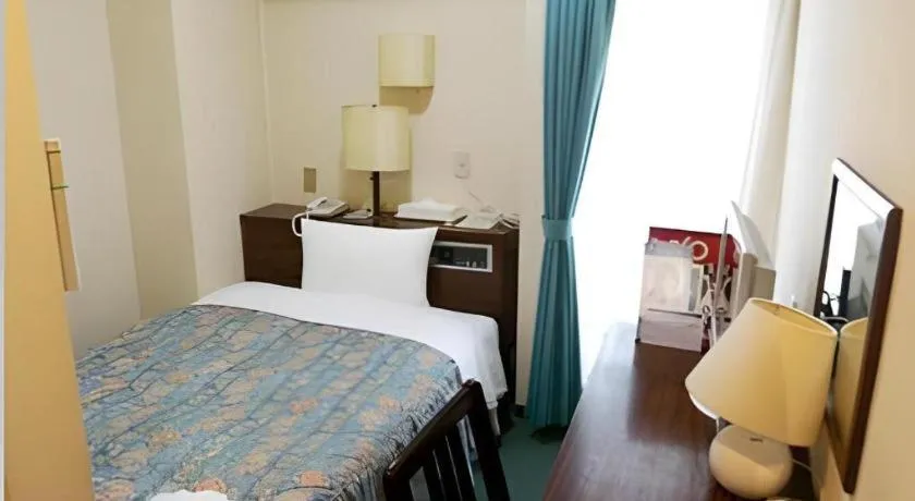 Bed in Hotel Tetora Tsurumi