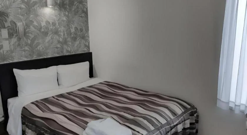 Bed in Hotel Tetora Tsurumi