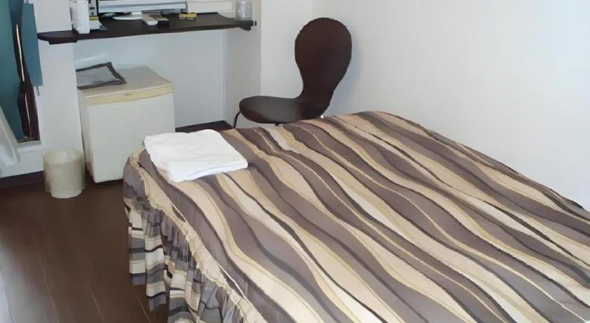 Bed in Hotel Tetora Tsurumi