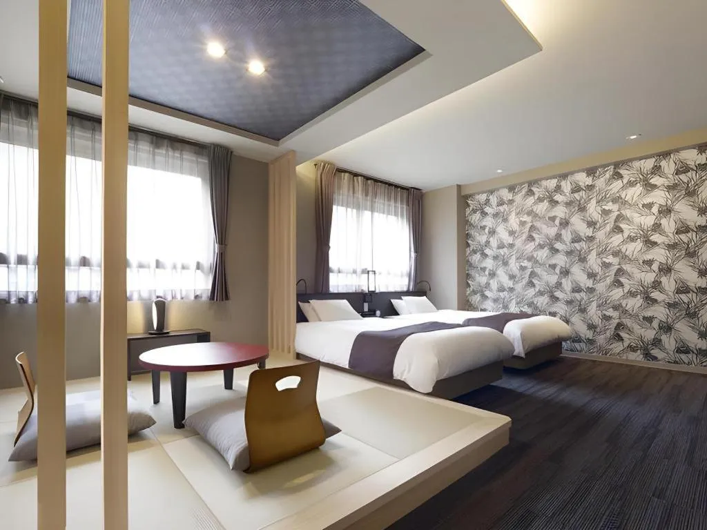 Bed in Hotel Obokekyo Mannaka