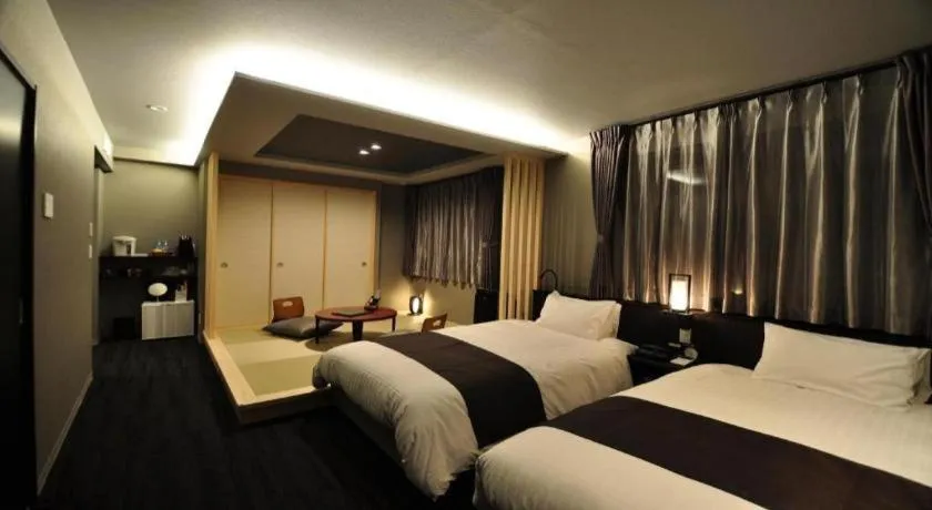 Bed in Hotel Obokekyo Mannaka