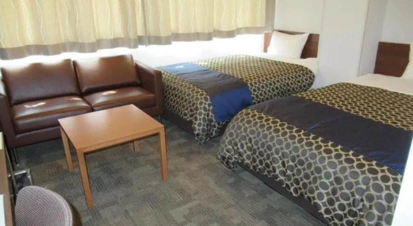 Bed in Utsunomiya Higashi Hotel