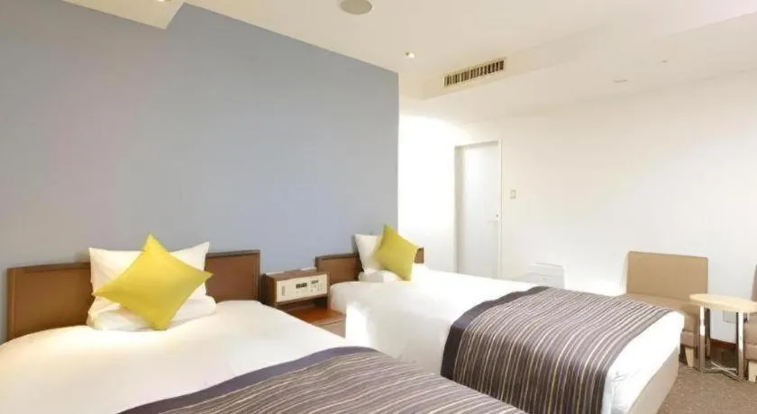 Bed in Utsunomiya Higashi Hotel