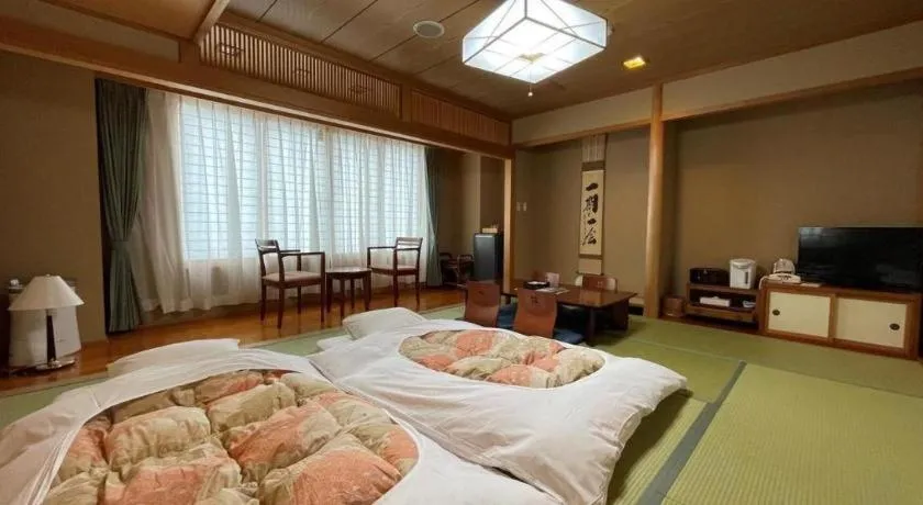 Bed in Mutsu Park Hotel