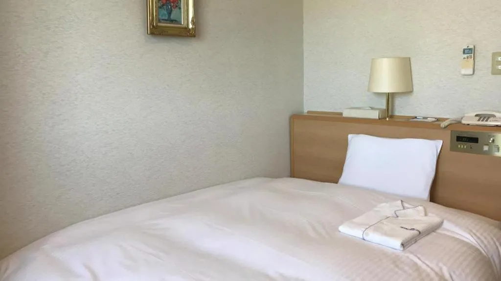 Bed in Mutsu Park Hotel