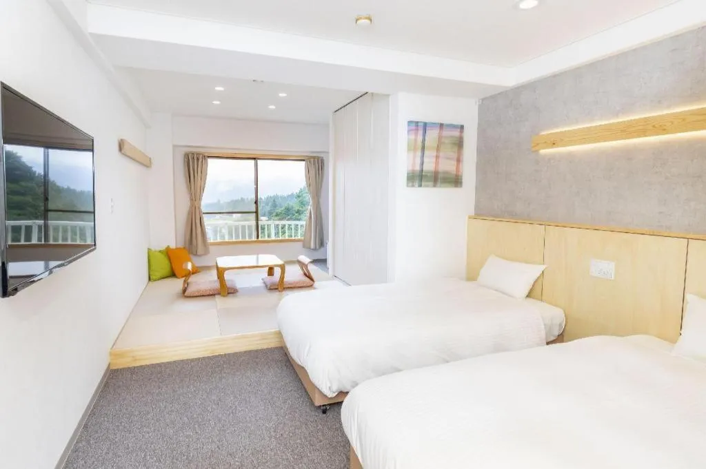 Bed in Muika Onsen Hotel