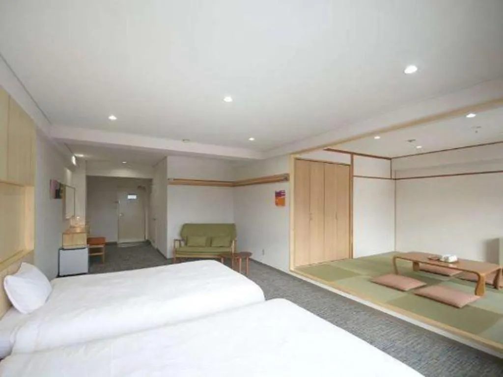 Bed in Muika Onsen Hotel