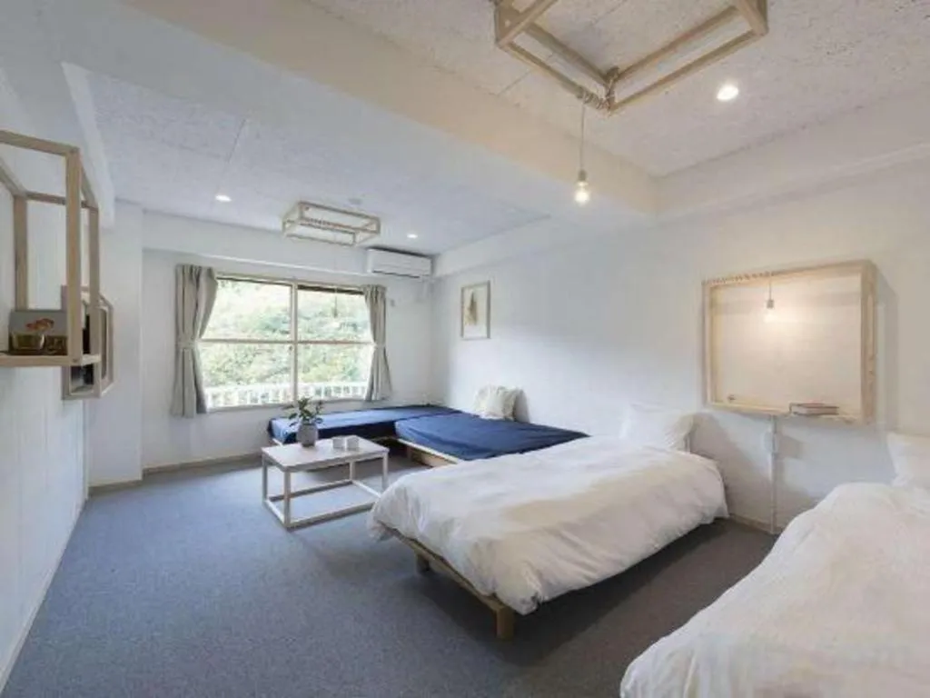 Bed in Muika Onsen Hotel