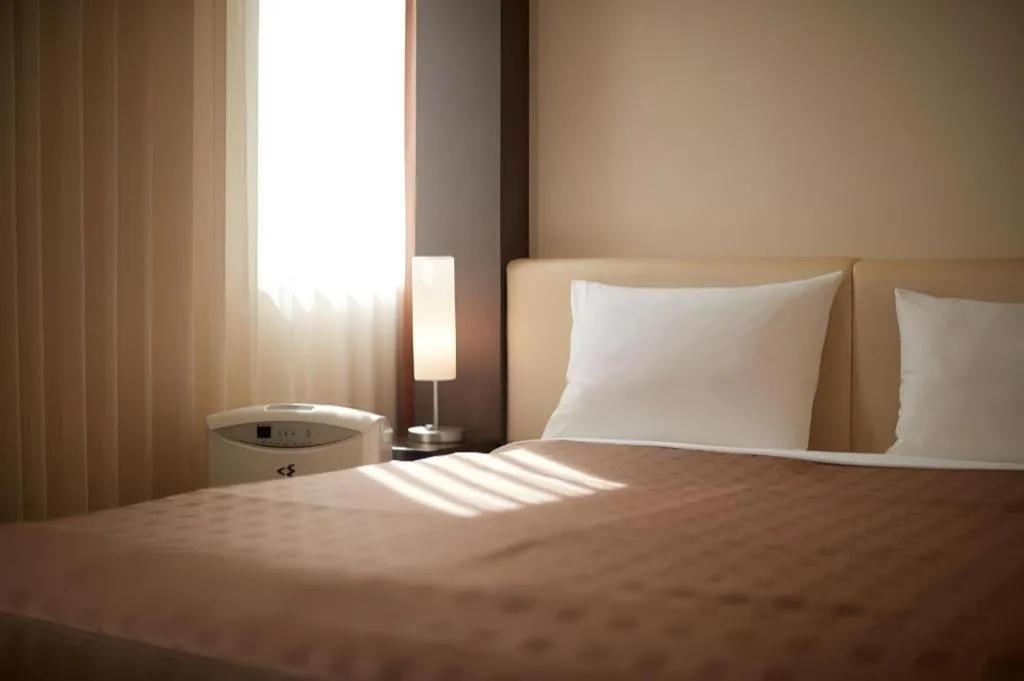 Bed in Hotel Yuquesta Asahibashi