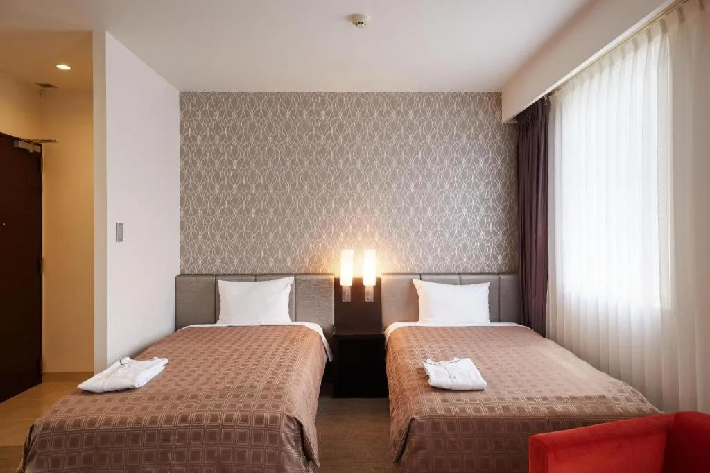 Bed in Hotel Yuquesta Asahibashi