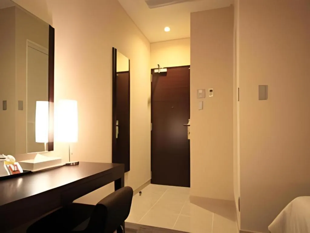 Bed in Hotel Yuquesta Asahibashi