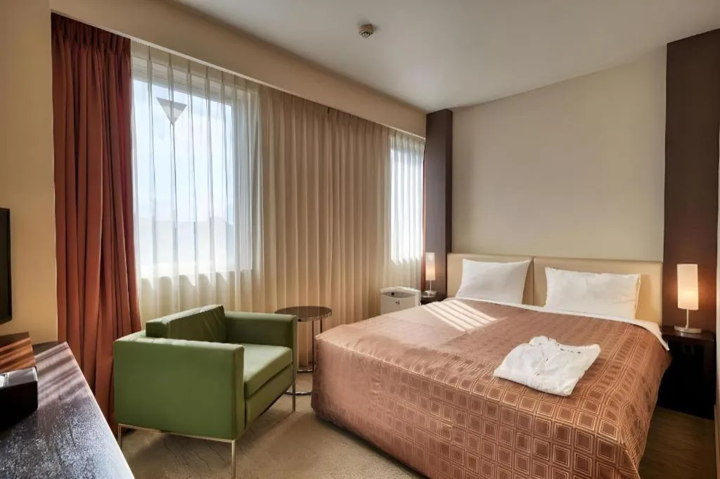 Bed in Hotel Yuquesta Asahibashi