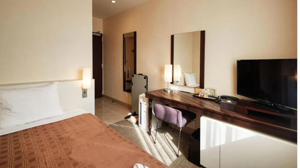 Bed in Hotel Yuquesta Asahibashi