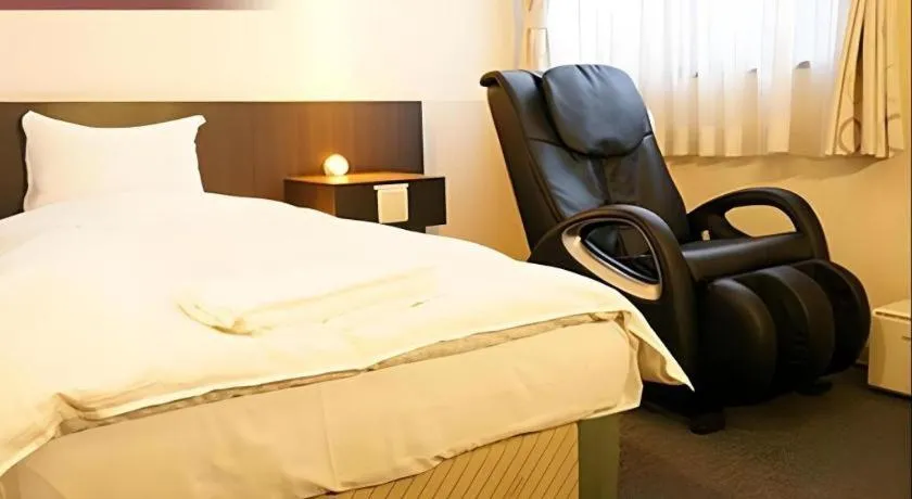 Bed in Hotel The Grand Court Matsusaka