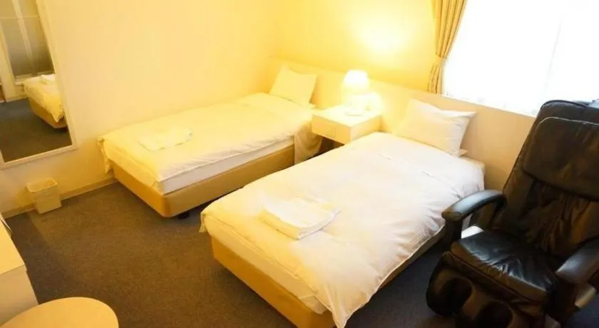 Bed in Hotel The Grand Court Matsusaka
