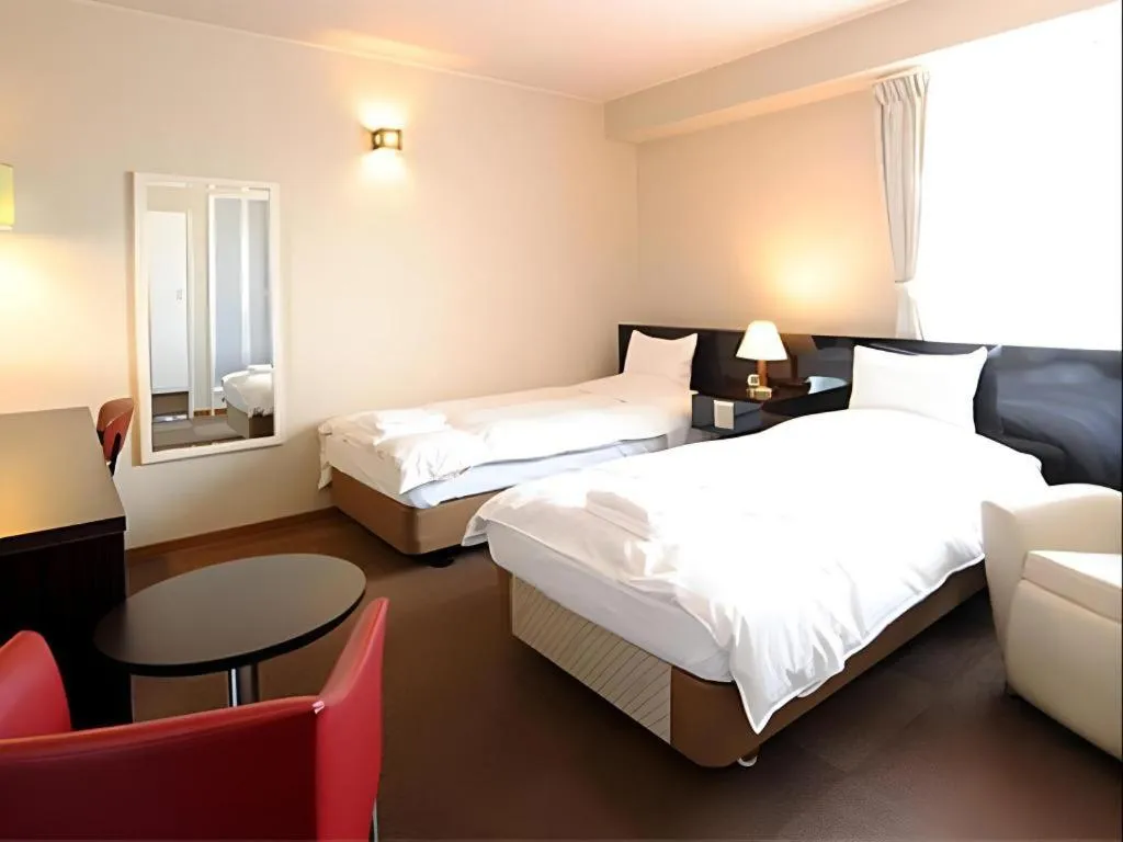 Bed in Hotel The Grand Court Matsusaka