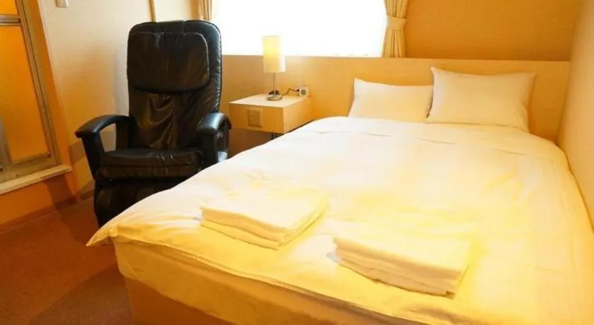 Bed in Hotel The Grand Court Matsusaka