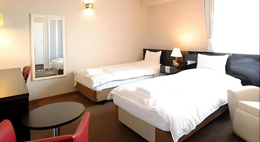 Bed in Hotel The Grand Court Matsusaka