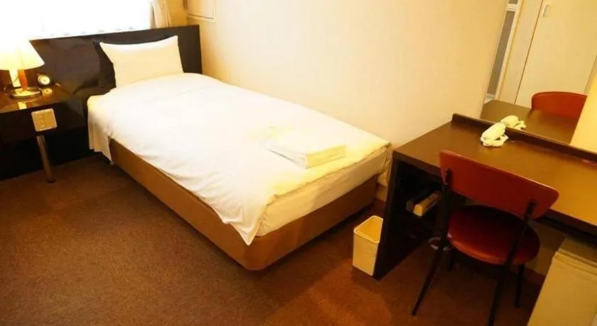 Bed in Hotel The Grand Court Matsusaka