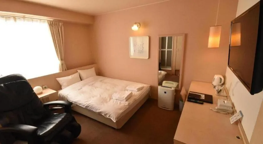 Bed in Hotel The Grand Court Matsusaka