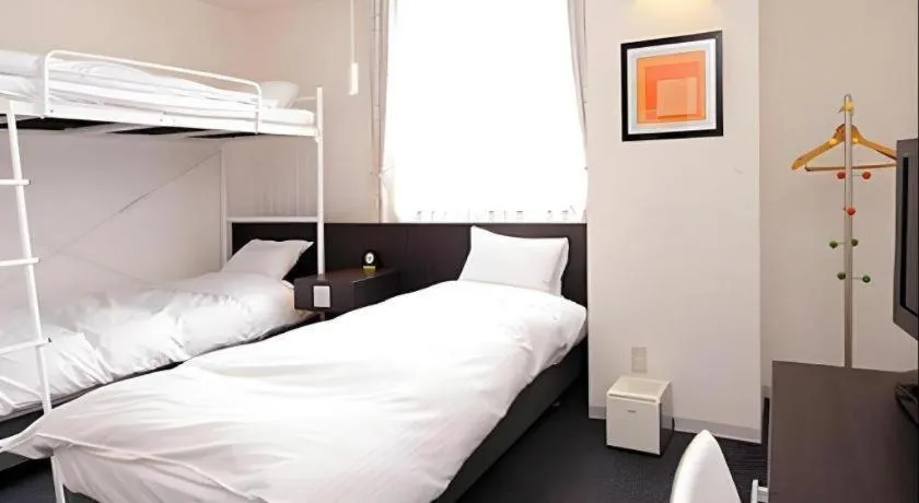 Bed in Hotel The Grand Court Matsusaka