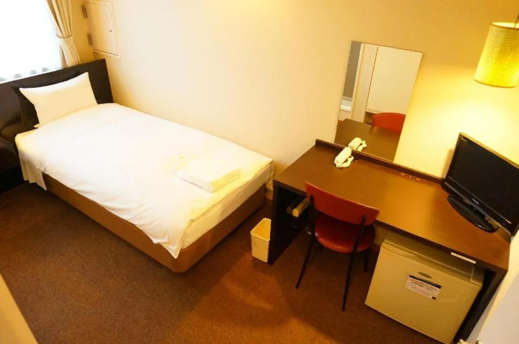 Bed in Hotel The Grand Court Matsusaka