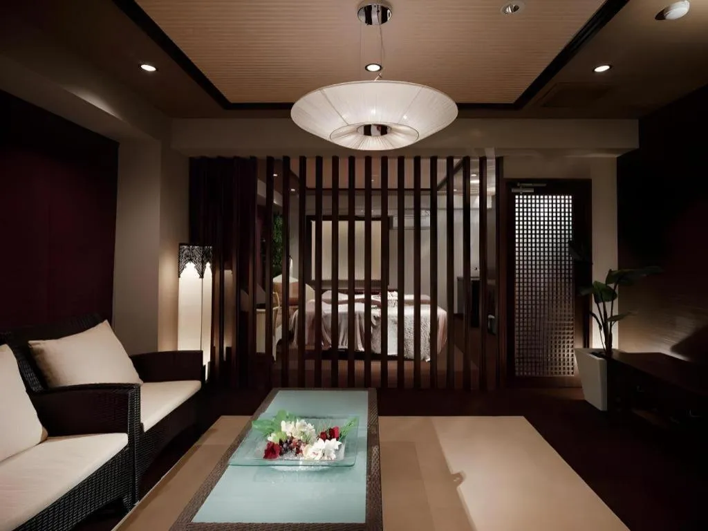 Bed in Sakuraan Kawaguchiko Hotel