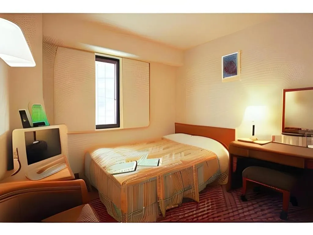 Bed in Mizue Dai-ichi Hotel