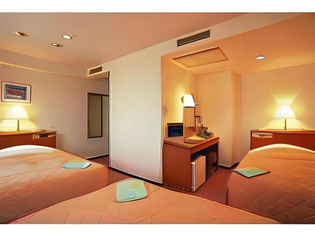 Bed in Mizue Dai-ichi Hotel