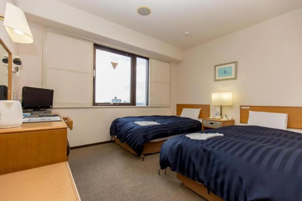 Bed in Kyoto Plaza Hotel Annex