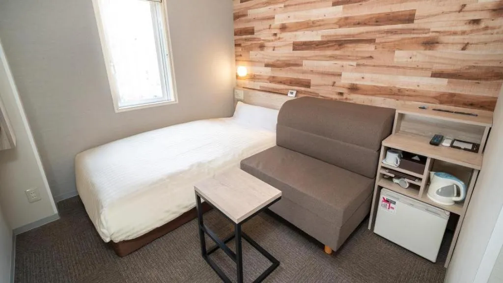 Bed in Super Hotel Hakodate