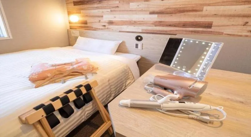 Bed in Super Hotel Hakodate