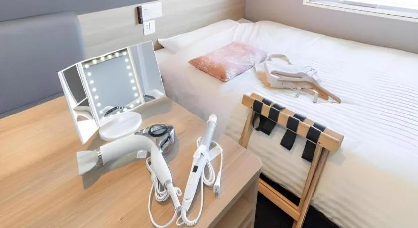 Bed in Super Hotel Hakodate