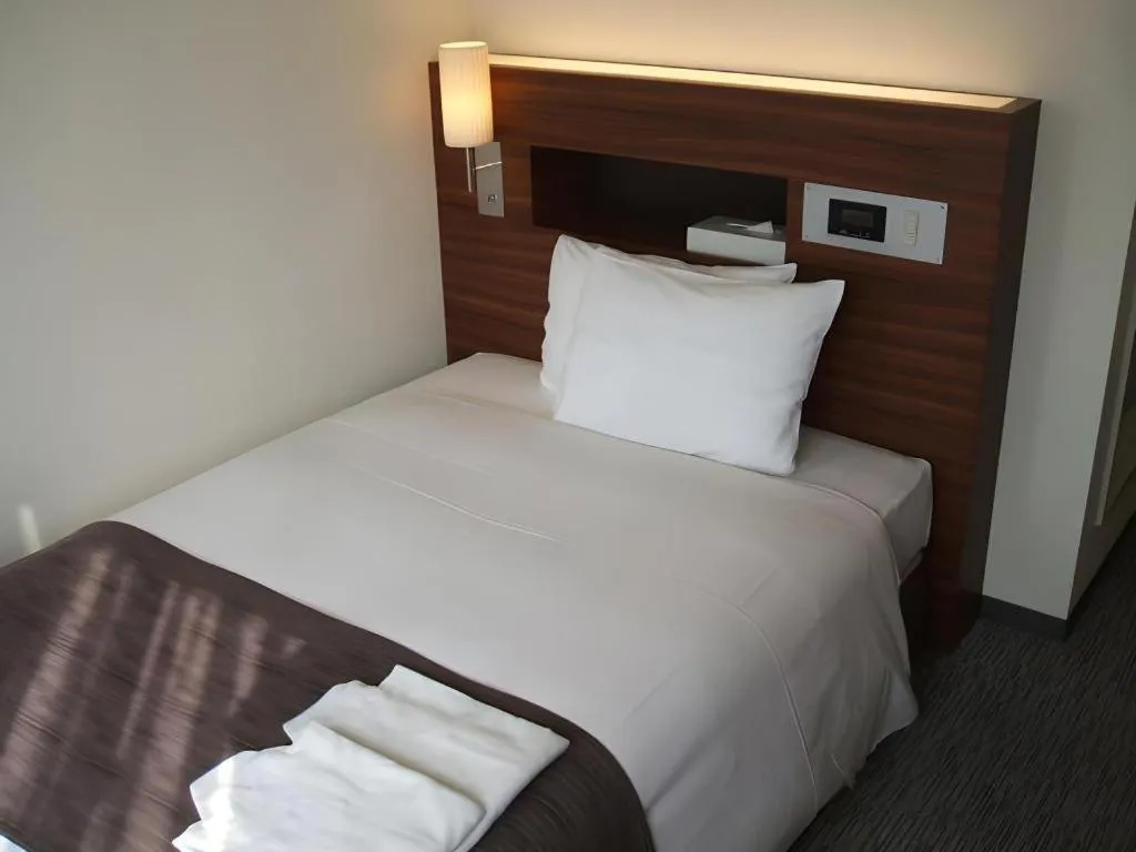 Bed in Shizuoka Daiichi Hotel
