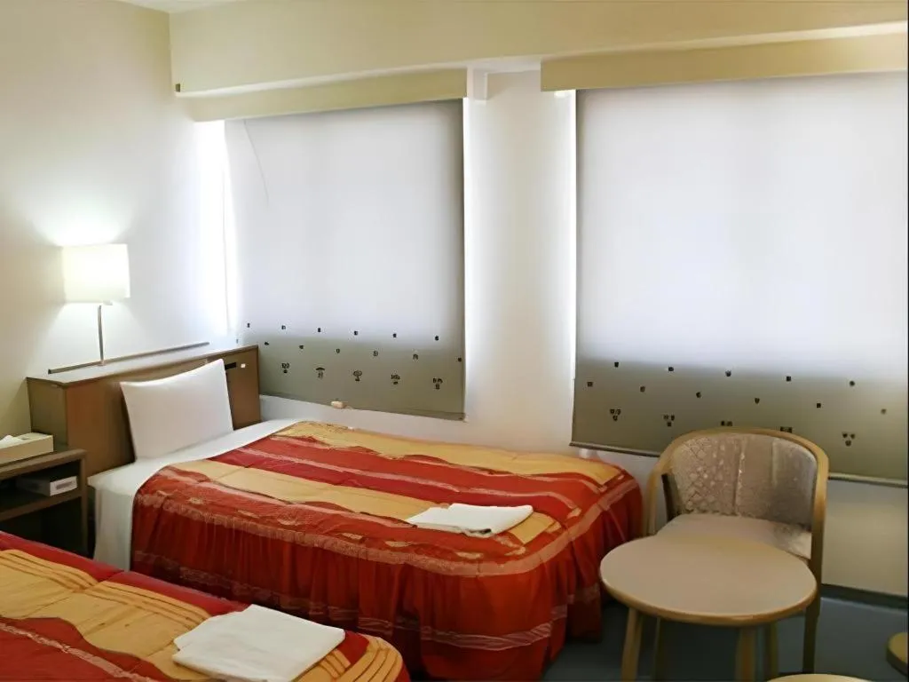 Bed in Shizuoka Daiichi Hotel