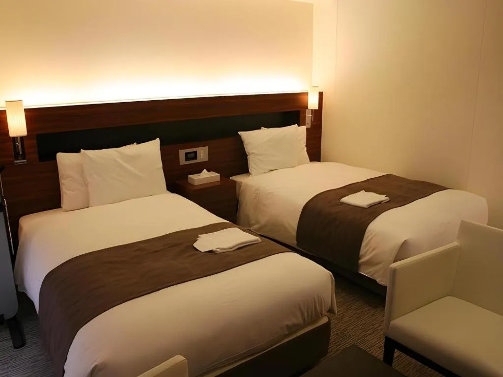 Bed in Shizuoka Daiichi Hotel