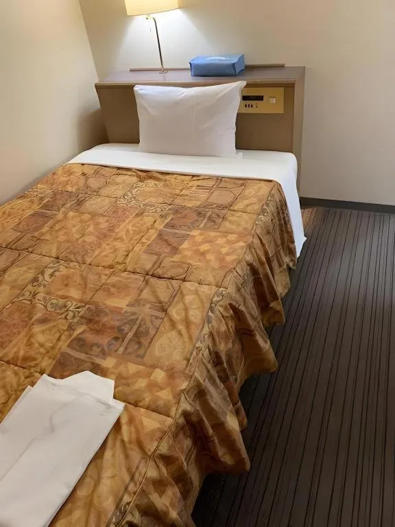 Bed in Shizuoka Daiichi Hotel