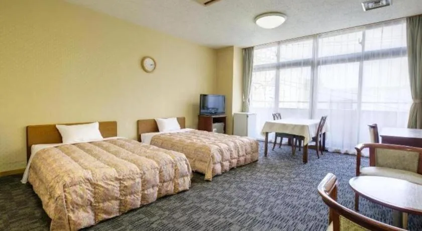 Bed in Yugawara Mizu No Kaori Hotel