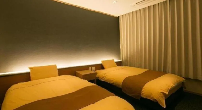 Bed in Yugawara Mizu No Kaori Hotel