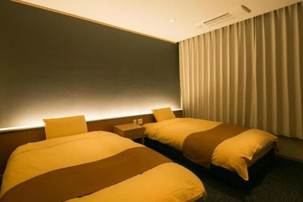 Bed in Yugawara Mizu No Kaori Hotel