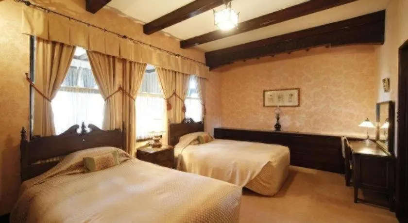 Bed in Unzen Kanko Hotel