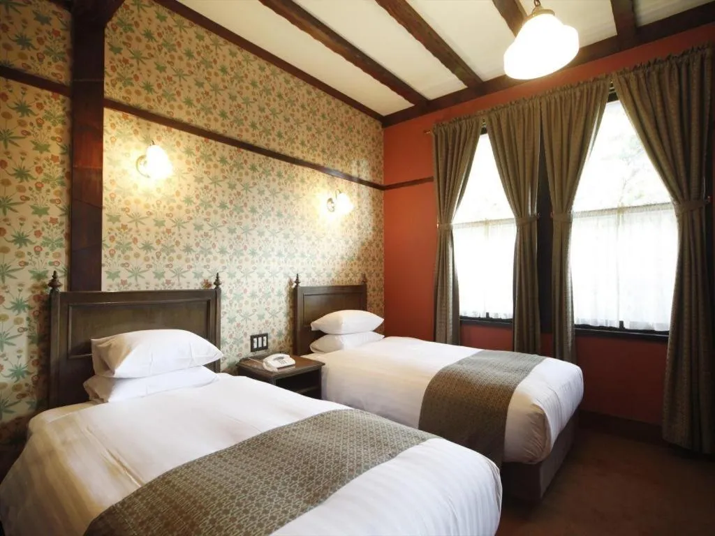 Bed in Unzen Kanko Hotel