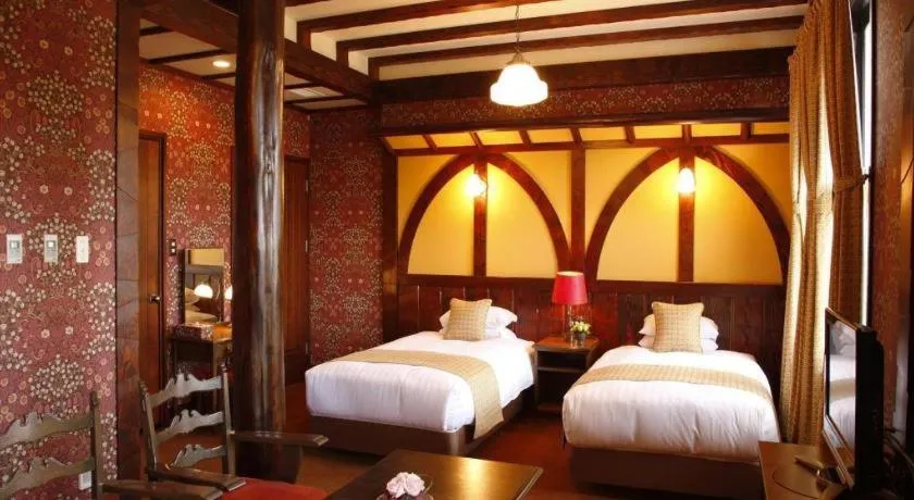 Bed in Unzen Kanko Hotel