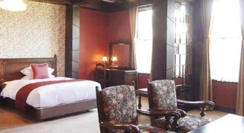 Bed in Unzen Kanko Hotel