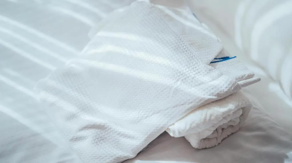 Bed in Hotel AreaOne Miyazaki City