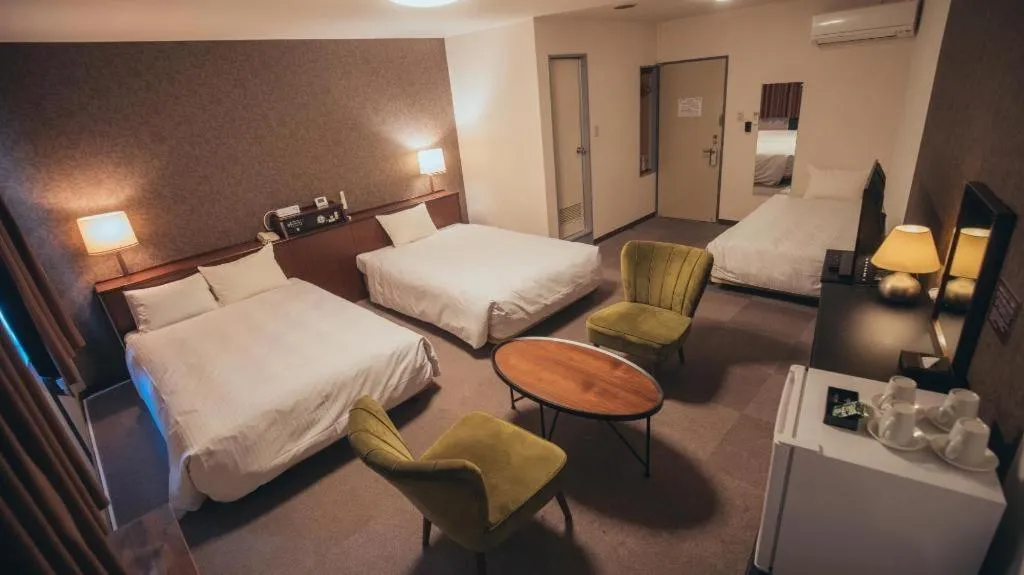 Bed in Hotel AreaOne Miyazaki City