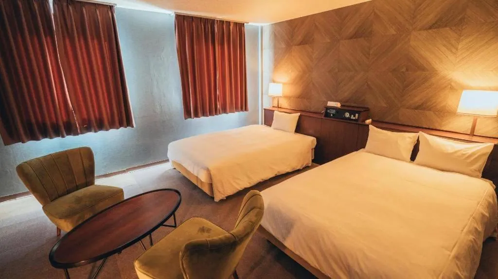 Bed in Hotel AreaOne Miyazaki City