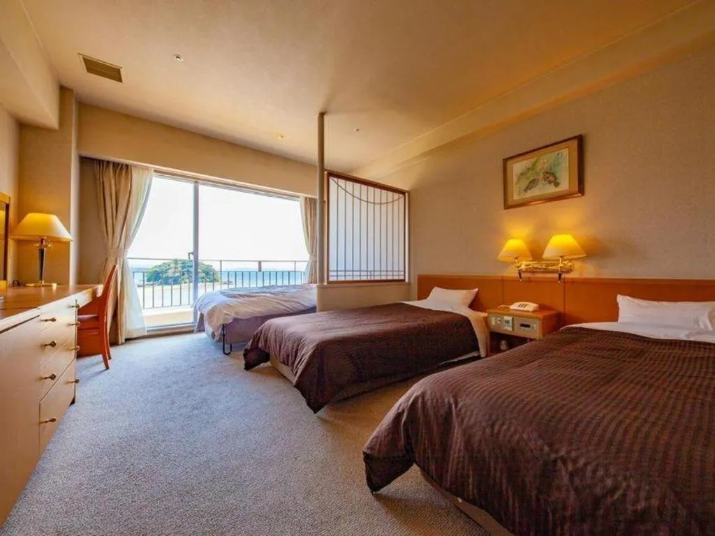 Bed in Hotel Takeshima